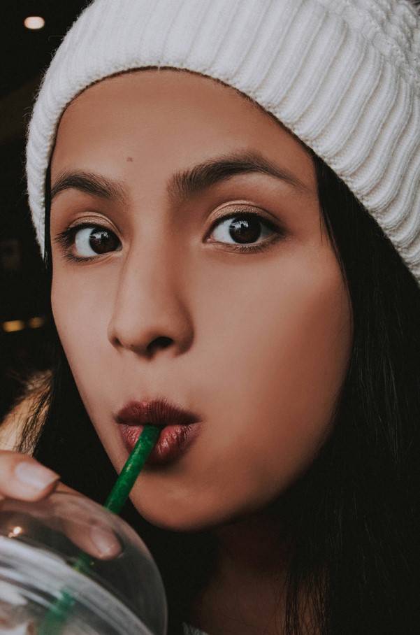 drinking through straw to avoid stains