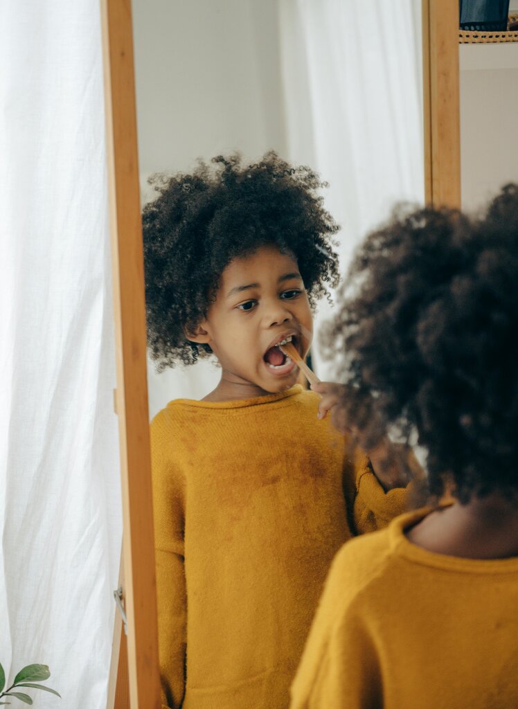 little boy brushing