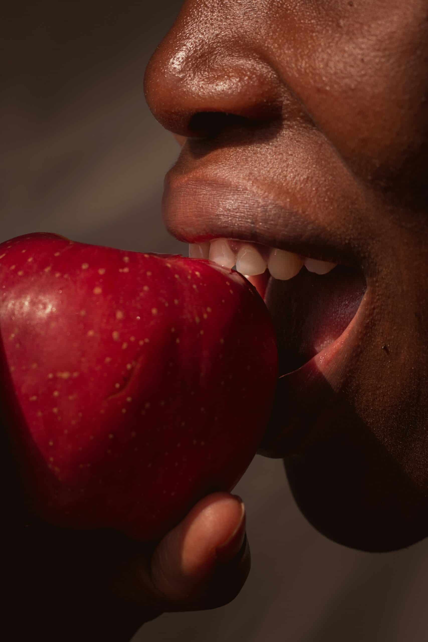 man eating apple